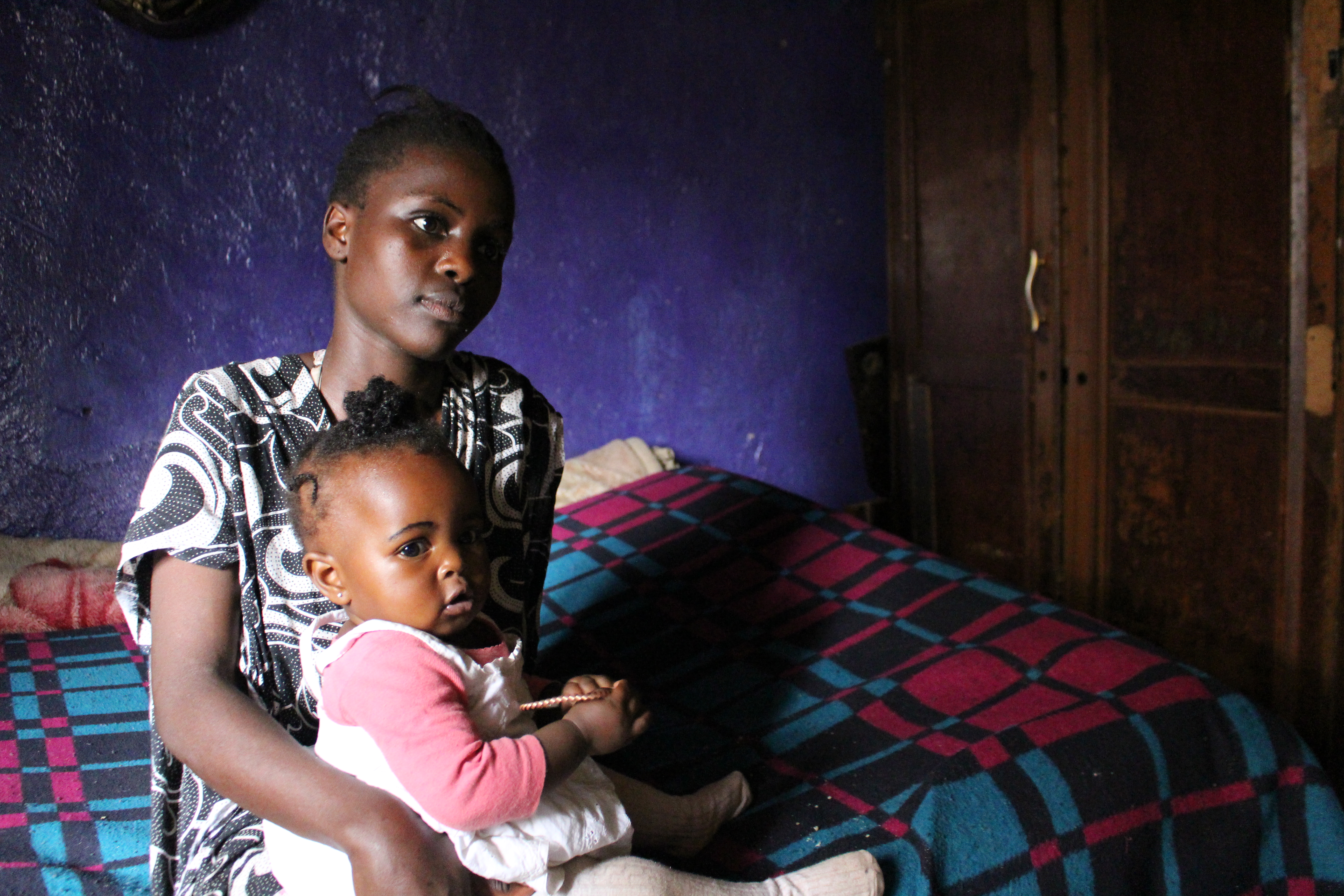 Kenyan woman with baby