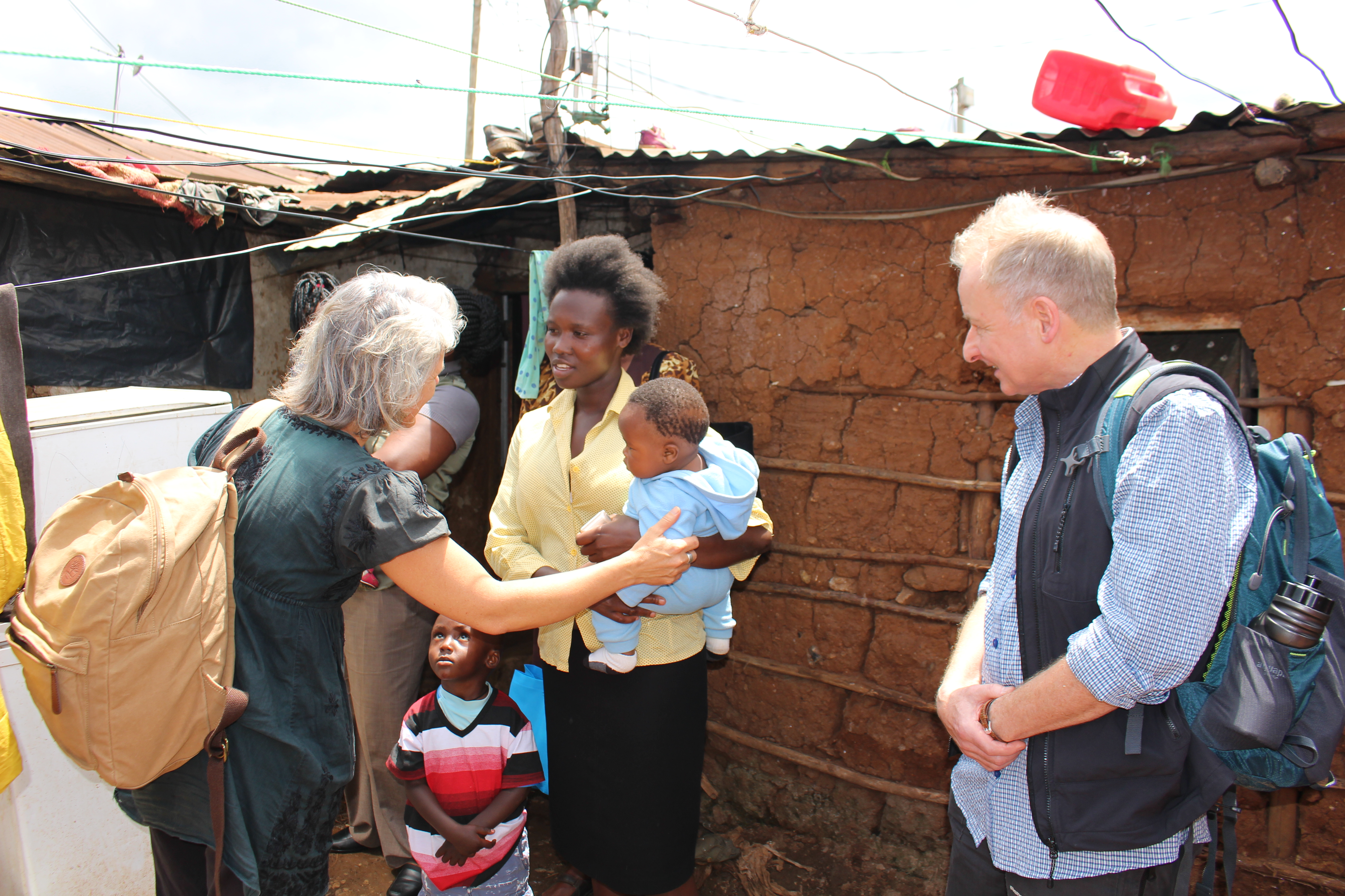 Robin and Monique meeting Kibera family