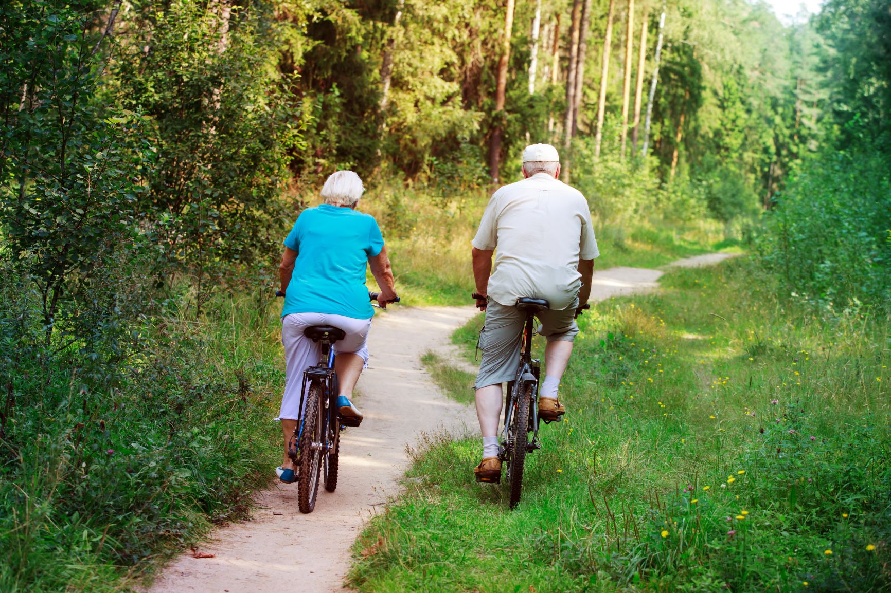 Old couple riding bikes