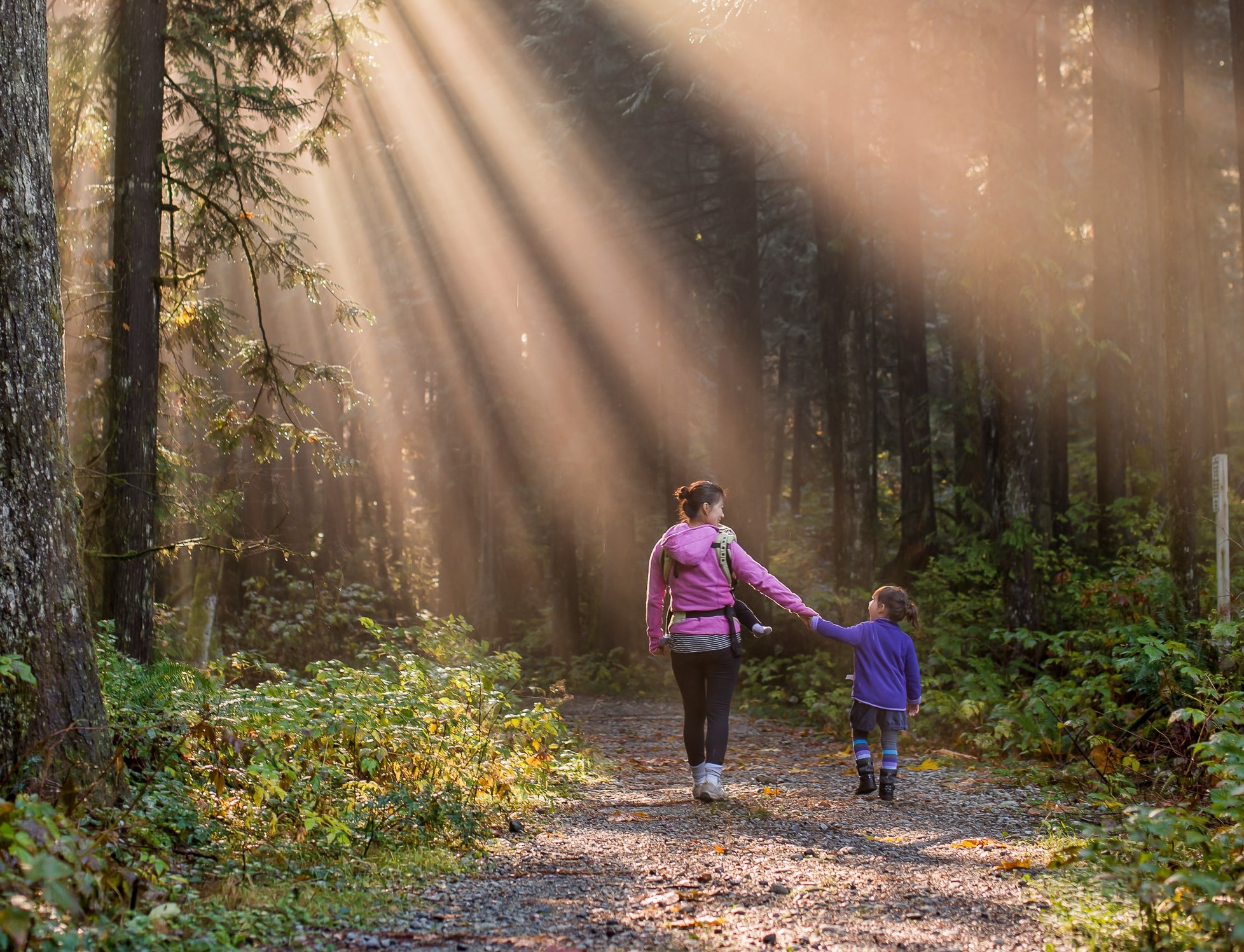 Mother and child in forest