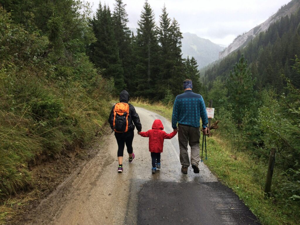 Parents and child, mountain road